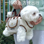 Small dog wearing Kivora Pets pet carrier outdoors